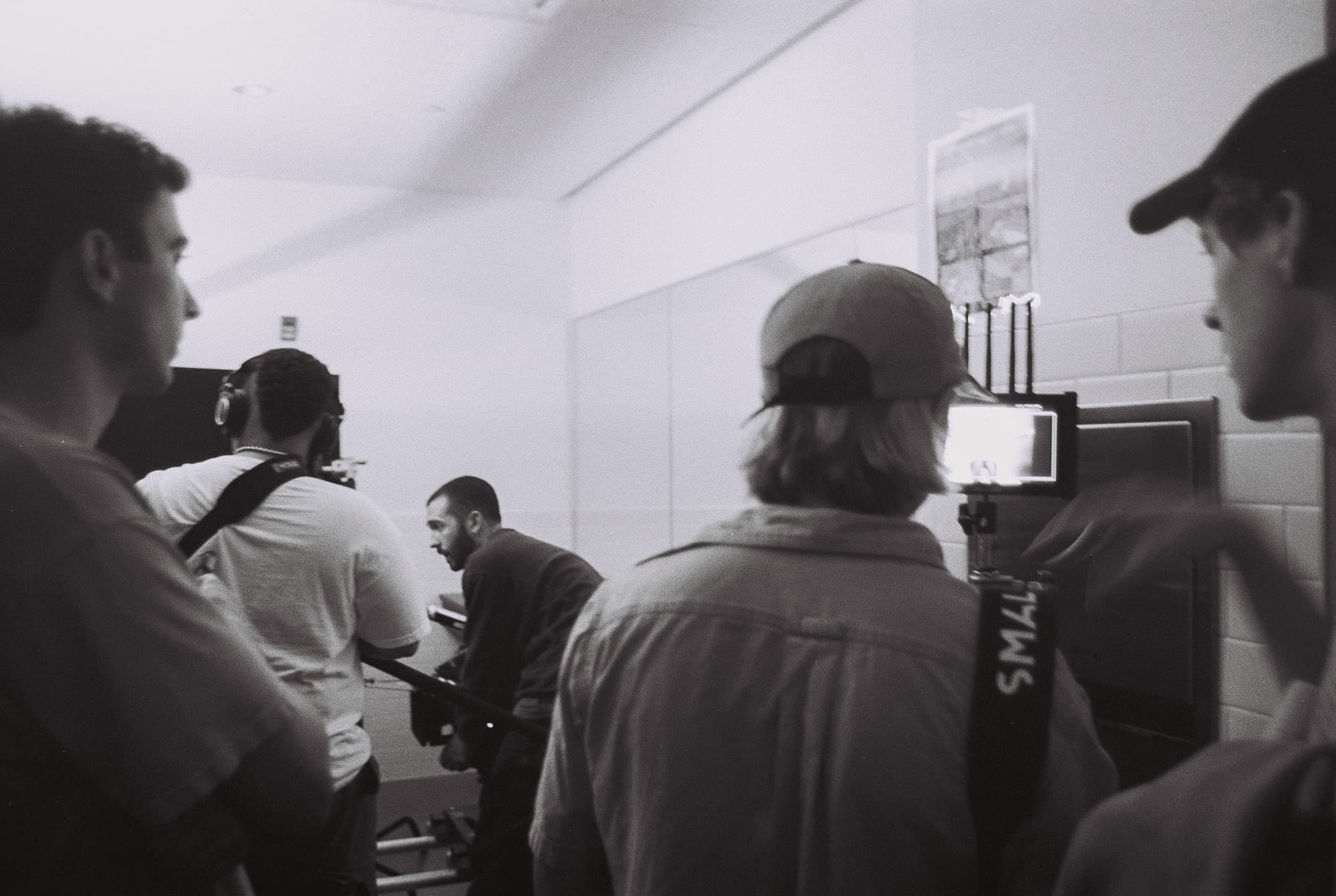 Behind the scenes, on black and white film.