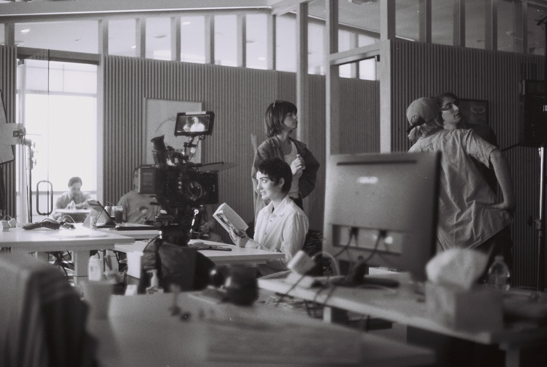 Behind the scenes, on black and white film.
