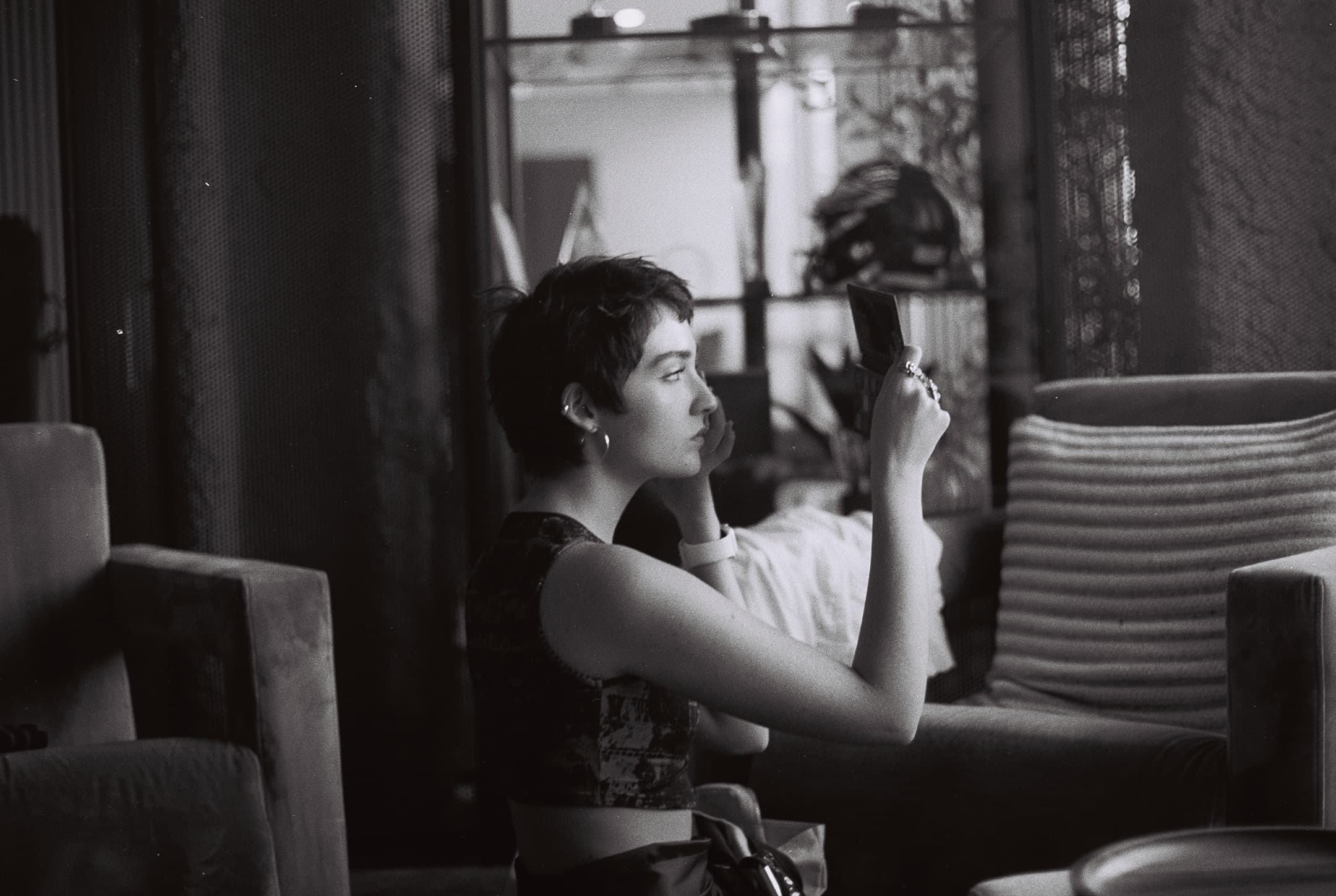 Behind the scenes, on black and white film.
