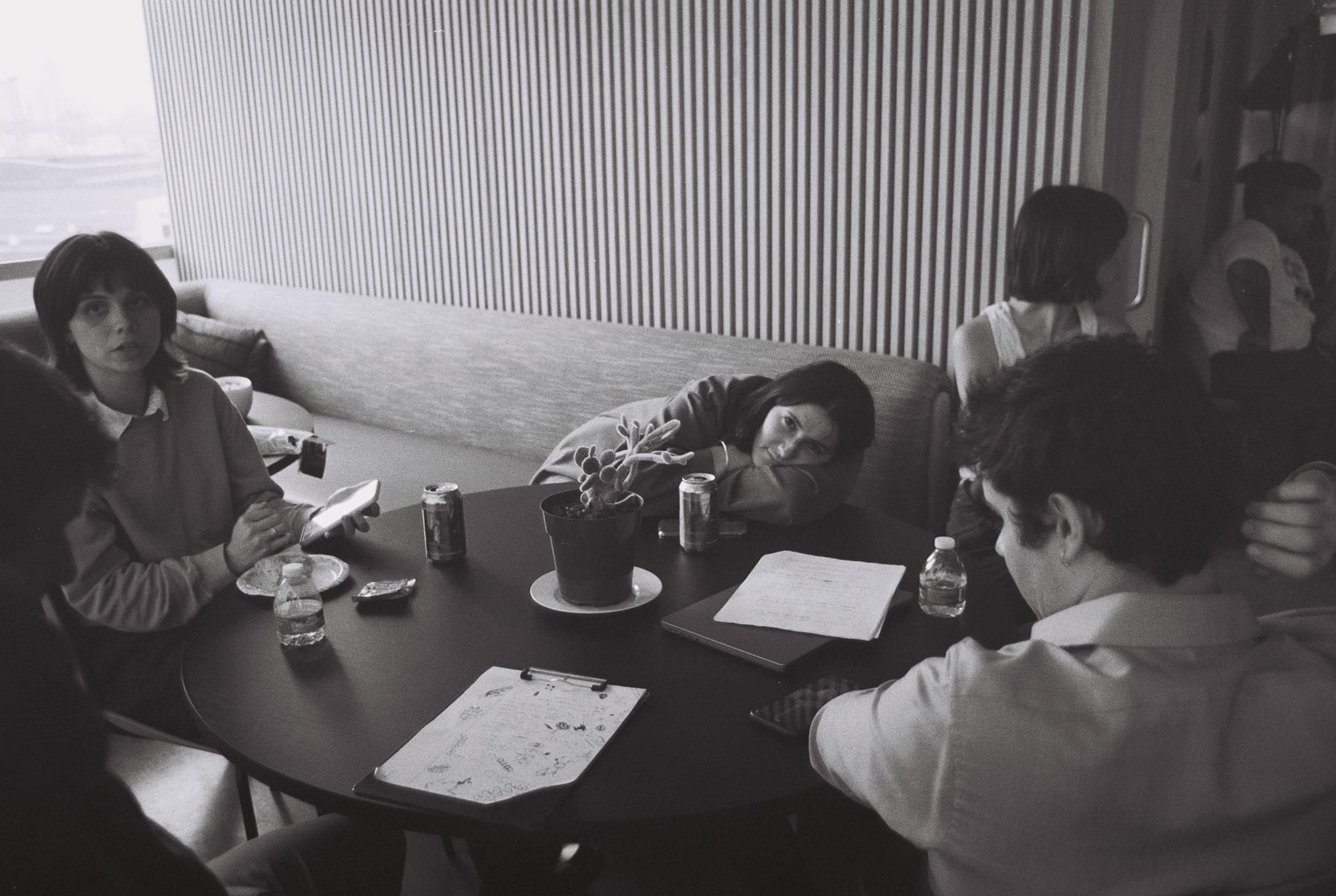 Behind the scenes, on black and white film.