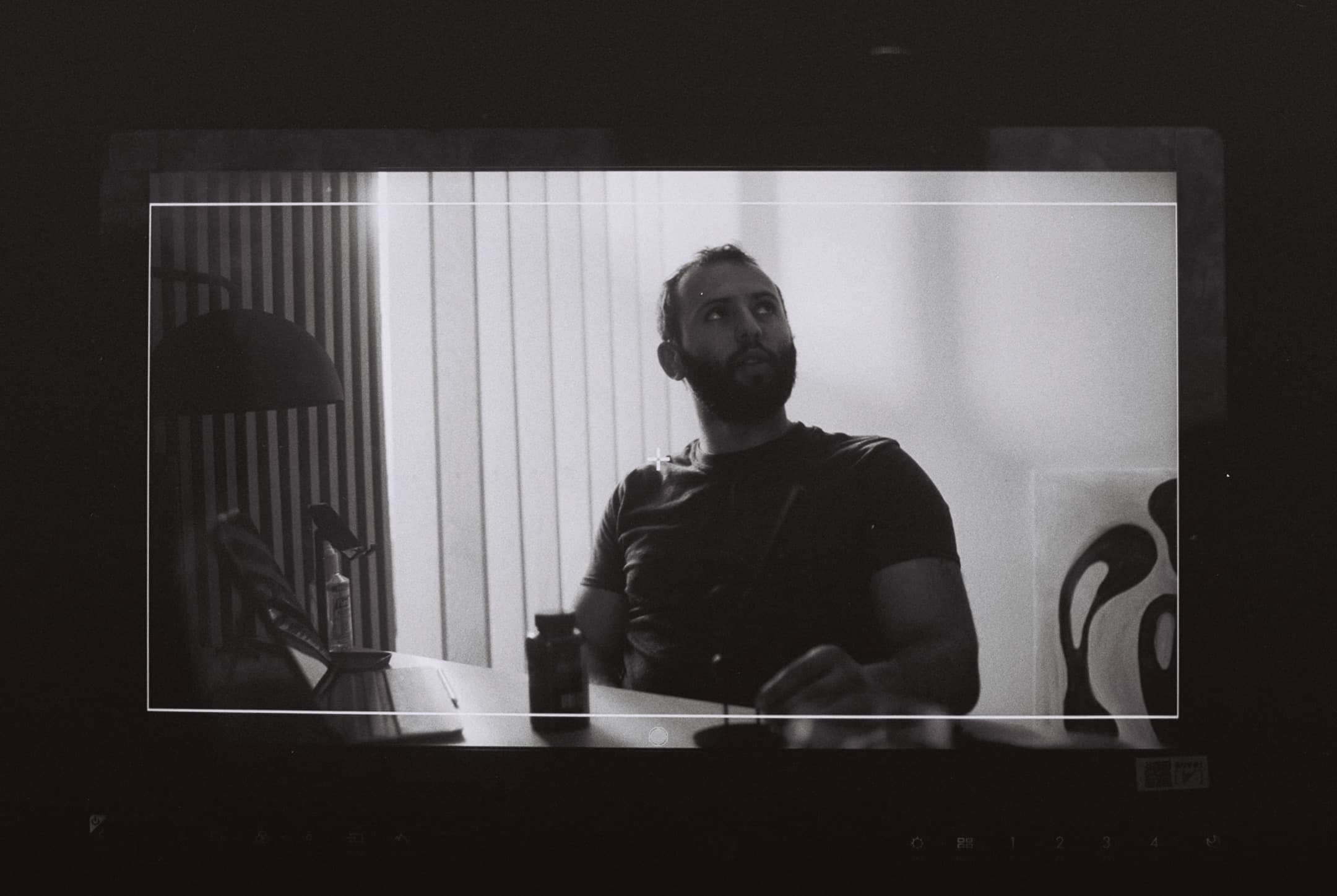 Behind the scenes, on black and white film.