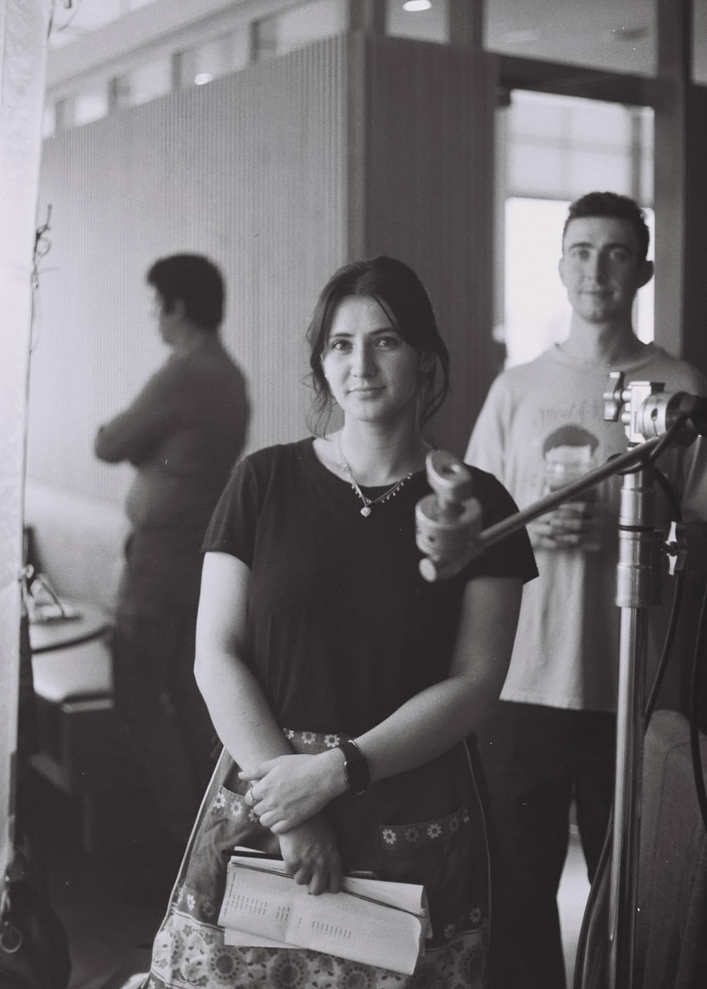 Behind the scenes, on black and white film.
