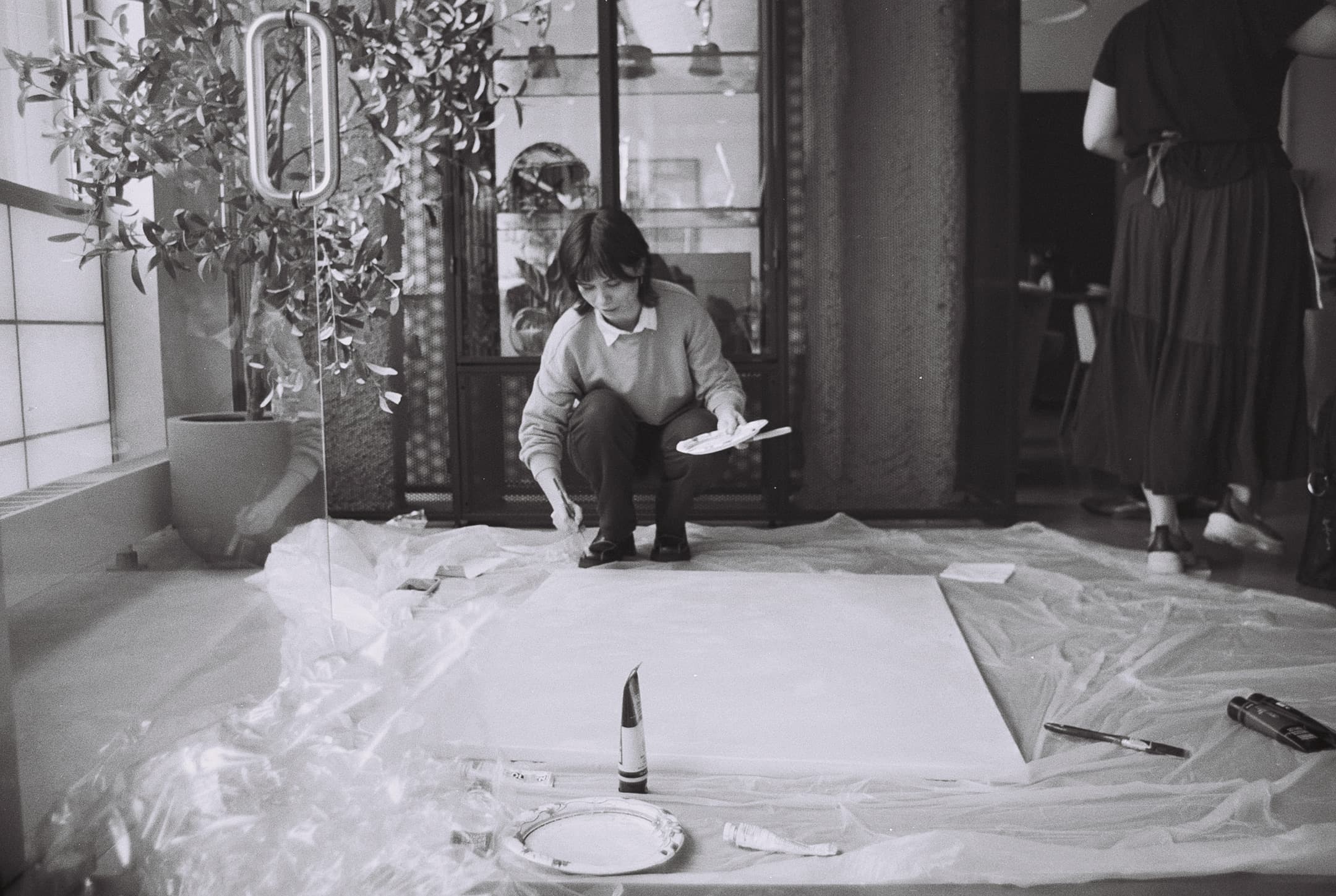 Behind the scenes, on black and white film.