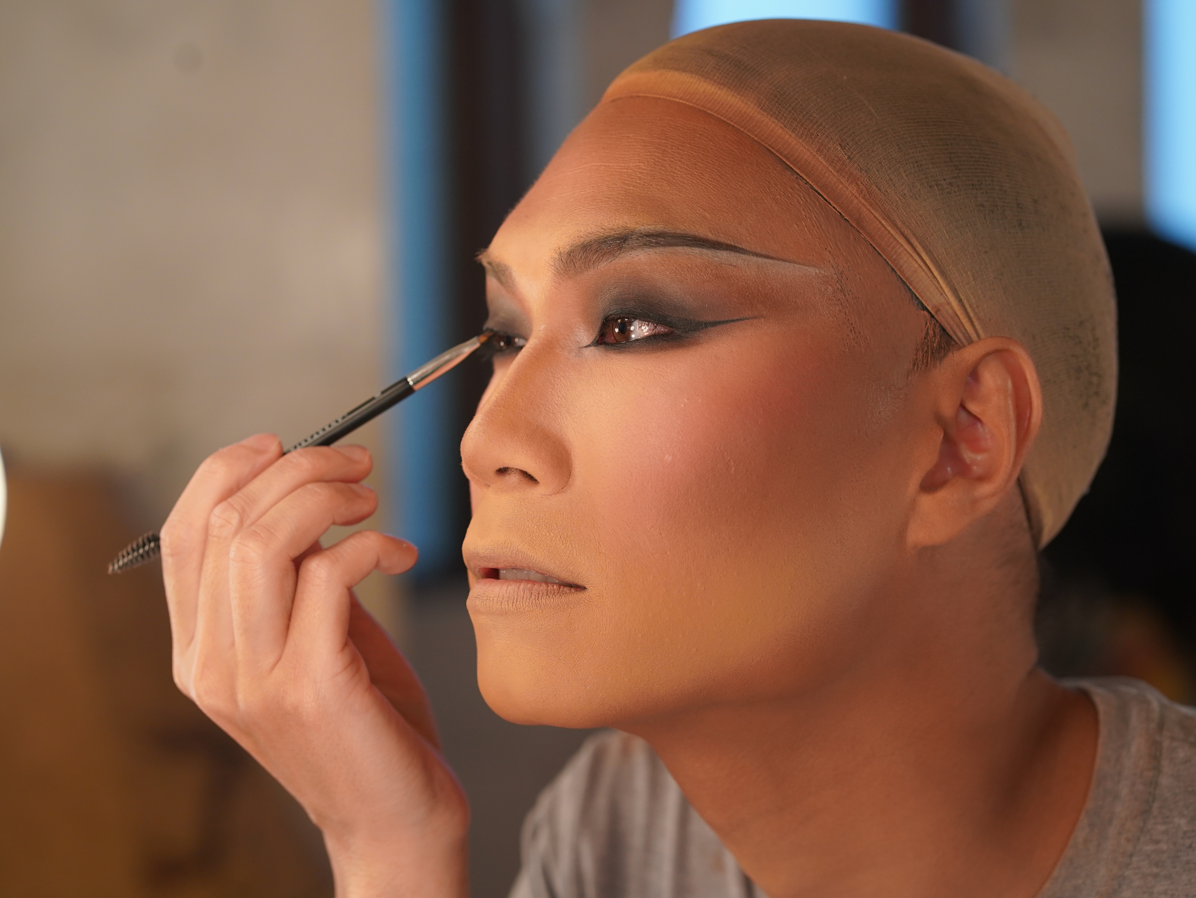 Harry Shum Jr. in makeup for Shimmer.